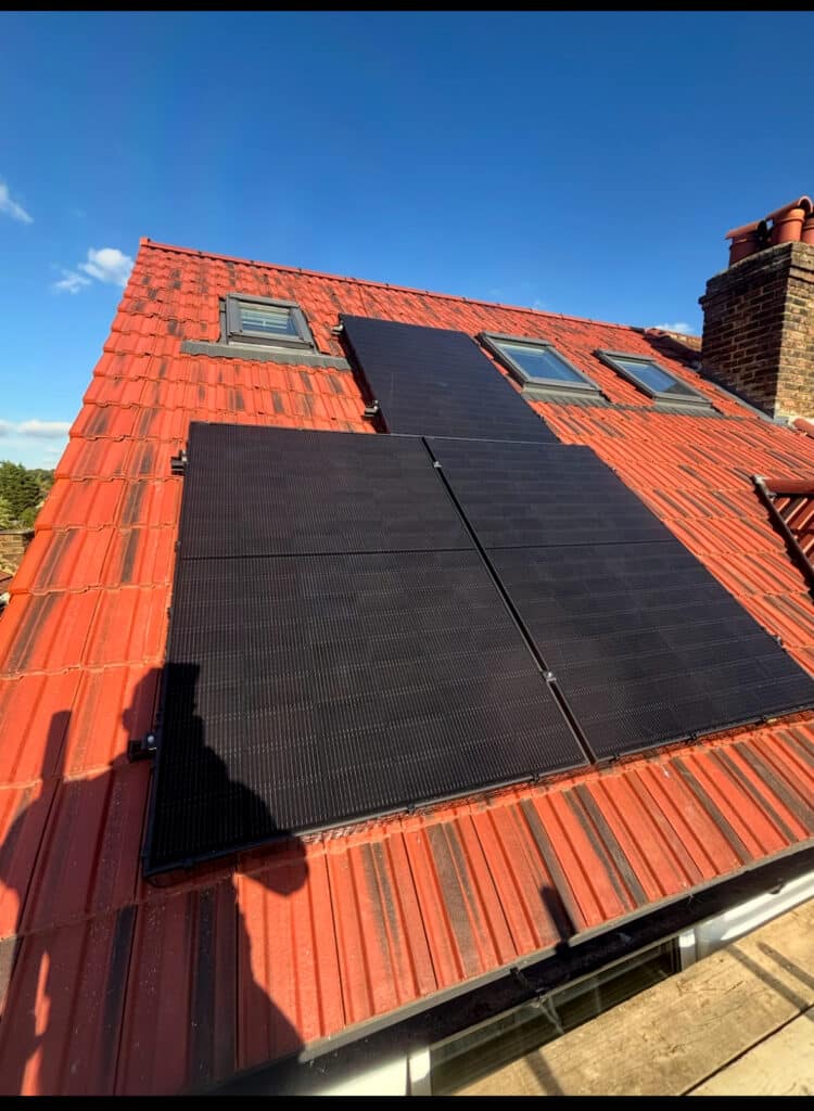 Solar panels on a south-facing roof in North London designed by Keenan Solar for maximum sunlight